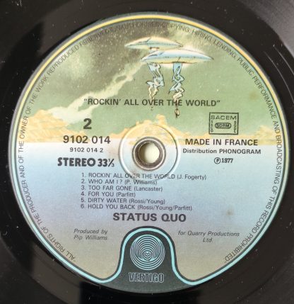 label vinyle 33tours artiste status quo titre rockin' all over the world vinyle d'occasion originvinylstore montauban