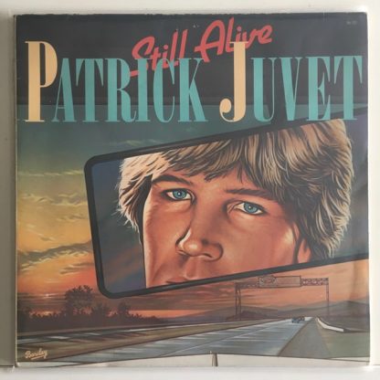 couverture vinyle 33tours artiste patrick juvet titre still alive vinyle d'occasion originvinylstore montauban