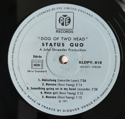 label vinyle 33tours artiste status quo titre dog of two head album vinyle d'occasion originvinylstore disquaire montauban